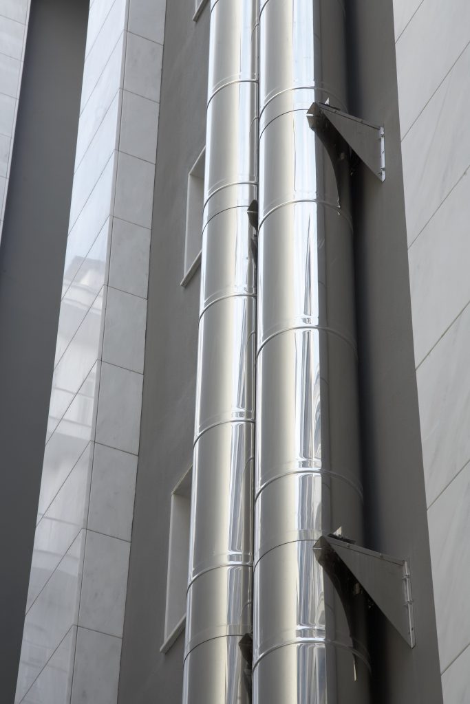 TWIN CHIMNEY FLUE PIPES